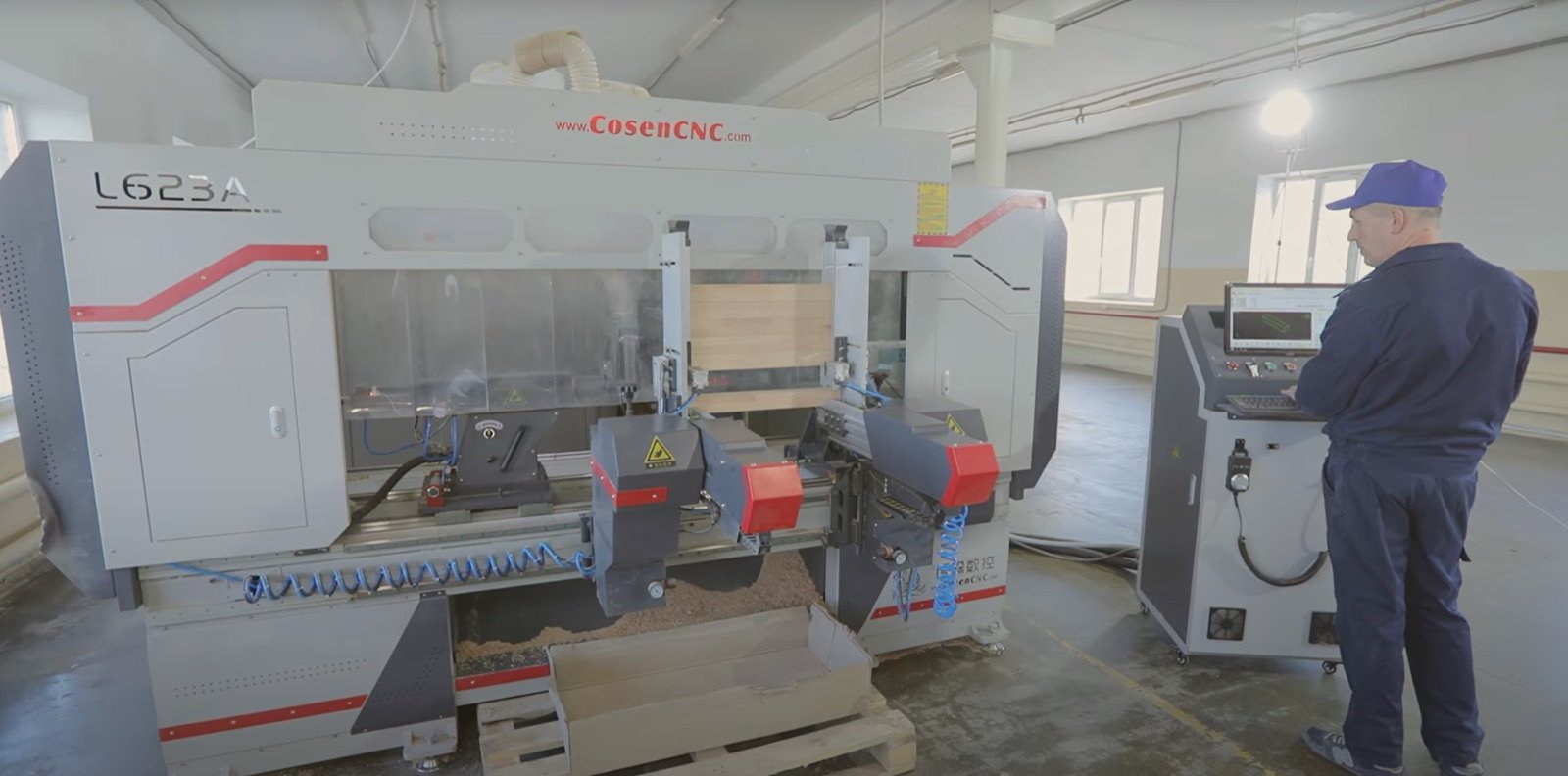 CNC machining center with an operator