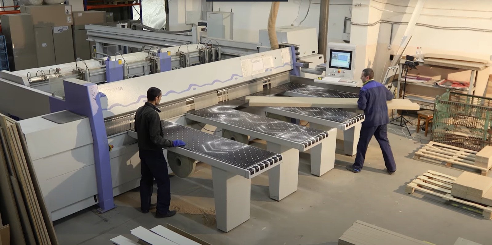 CNC panel saw cutting boards on the factory floor